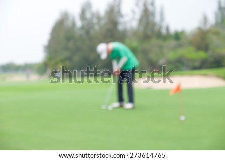 Man playing golf on green grass for sport or golf tournament background