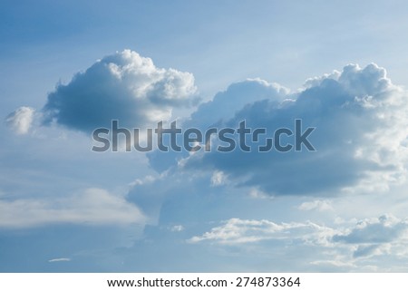 Fluffy clouds with grey blue sky for horizon background