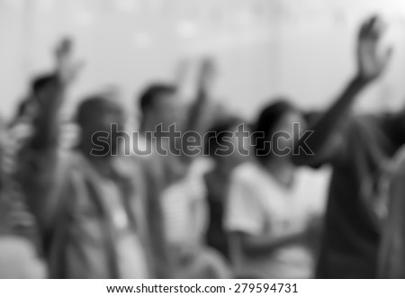 People raising hands to worship with singing choir for religion background