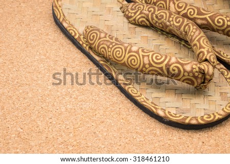 Handmade Thai sandles or sandals for footwear on brown background
