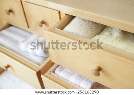 Neatly arranged clothing in drawers