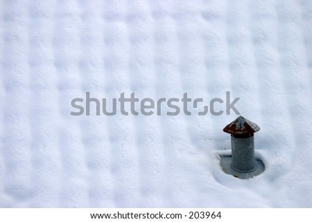 Snow covered roof with a small chimney (horizontal shot)