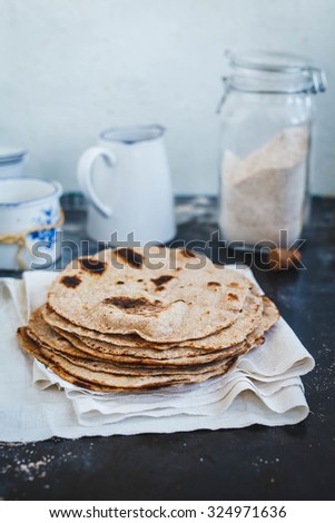 Stack wholegrain flatbread. Middle eastern food homemade concept .