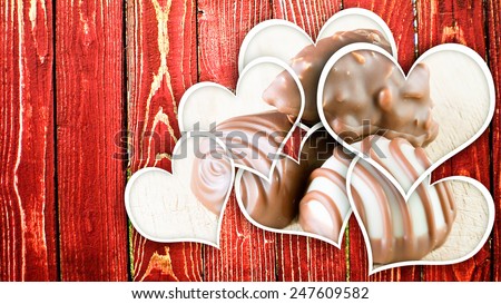 Chocolate pralines on wood. Macro image. Special Think for saint Valentine day