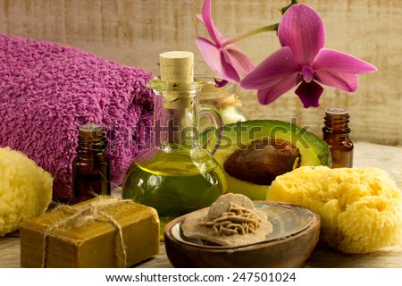 Spa welness products -orchid ,stones, towel, bowl of Spa salt