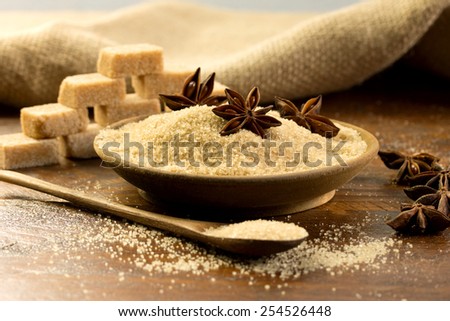 brown sugar and sugar cubes on a rustic table