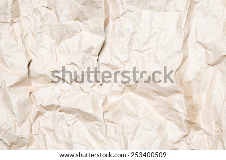 Paper texture - old brown paper sheet / wrinkled brown paper texture background