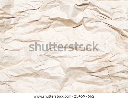 Paper texture - old brown paper sheet / wrinkled brown paper texture background