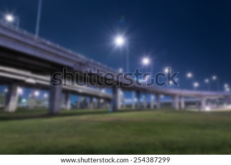 tollway express road with grass lawn in night scene