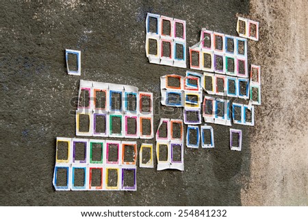 empty multicolor frame sticker on grunge old concrete wall