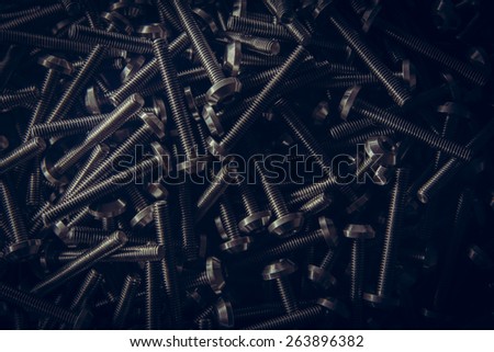 texture background of custom hex head bolt screw thread on tray with any light direction in studio