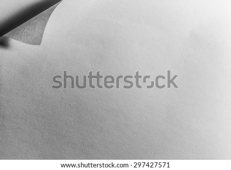 black and white tone  for sad emotion , texture background of  paper with corner curl