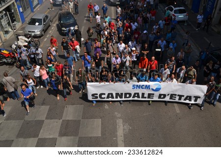 Marseille, France - June 26, 2014: Employees of the Societe nationale Corse Mediterranee (SNCM) denounce government\'s reforms and austerity politics.