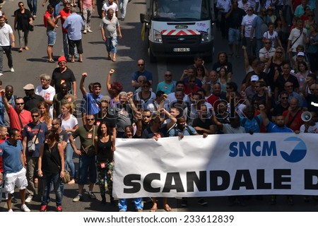 Marseille, France - June 26, 2014: Employees of the Societe nationale Corse Mediterranee (SNCM) denounce government's reforms and austerity politics.