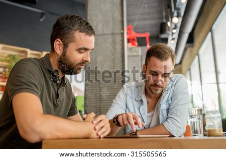 Two Young Man in Coffee Shop