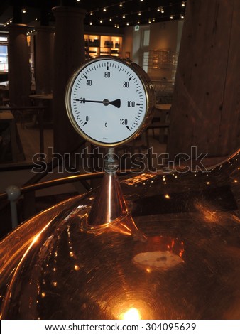 Temperature gauge on a micro brewery.