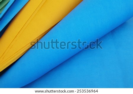 Bright rolls of color paper close up