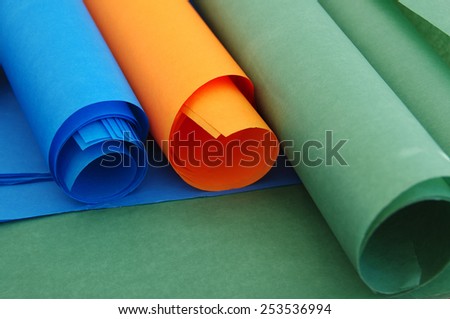 Bright rolls of color paper close up