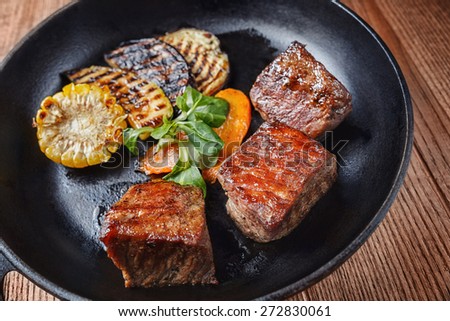 Grilled of Beef with rustic vegetables on a pan