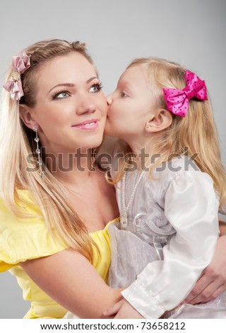Beautiful young mum and her daughter