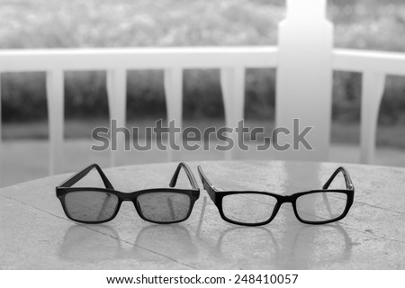 Blur background, A bit blur of glasses with blur background in black and white style