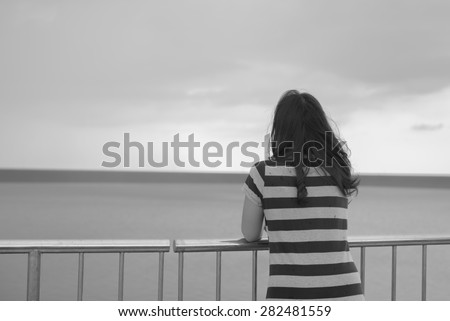 Woman stand thinking in black and white style