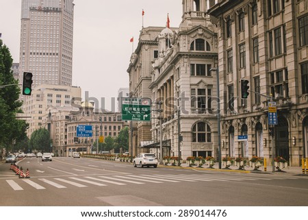 SHANGHAI - JUN 13 : Old buildings and street view in Waitan of Shanghai on June 13, 2015, Shanghai, China