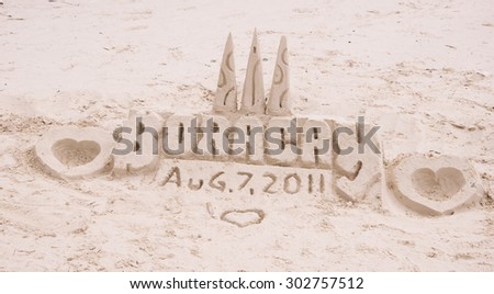 Sand castle on tropical white sand beach  in Boracay, Philippines