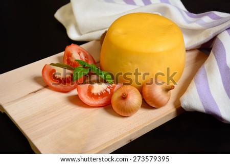 Traditional romanian cheese with onion and slice tomato slices, cascaval traditional