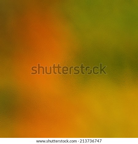 art abstract glass textured background in gold, orange and green colors