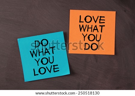 \'Love What You Do and Do What You Love\' notes pasted on blackboard.