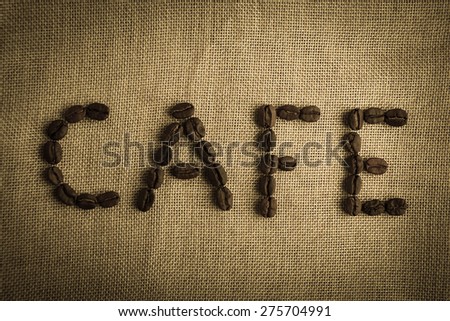 Roasted coffee beans making the word \