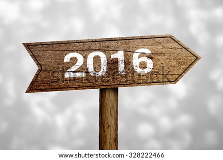 New Year 2016 Ahead road sign with beautiful bokeh background.