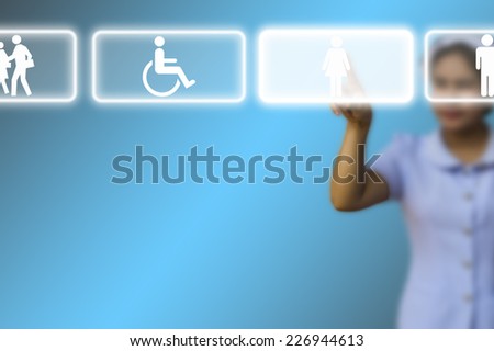 Medical doctor woman use innovative technologies and touch empty touchscreen with icon in the air on blue background