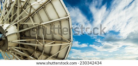 satellite dish on blue sky background