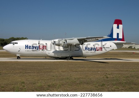 Luqa, Malta August 6, 2008: HeavyLift Cargo Airlines Short SC-5 Belfast C1, the only airworthy Belfast remaining exits taxiway \