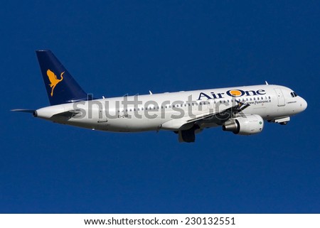 Luqa, Malta March 19, 2011: Air One Airbus A320-216 on climb out after taking off runway 13.