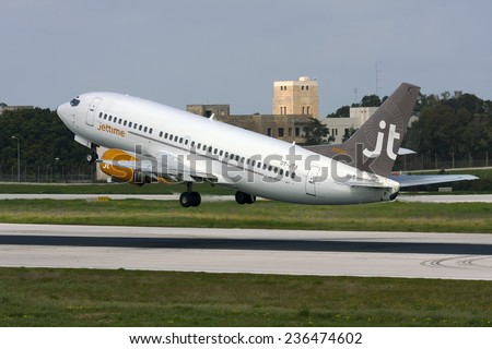 Luqa, Malta March 1, 2008: Jet Time Boeing 737-33A takes off from runway 31.
