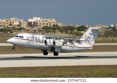 Luqa, Malta September 2, 2004: Club Air British Aerospace BAe-146-200 lifts off from runway 32.