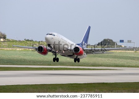 Luqa, Malta January 22, 2005: Scandinavian Airlines - SAS Boeing 737-683 takes off from runway 32.