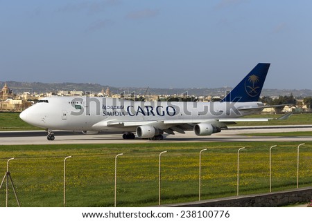Luqa, Malta December 16, 2014: Saudi Arabian Airlines Cargo (Air Atlanta Icelandic) Boeing 747-4H6(BDSF) entering runway 31 via taxiway \