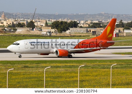 Luqa, Malta December 16, 2014: Hamburg Airways Boeing 737-430 entering runway 31 via taxiway \