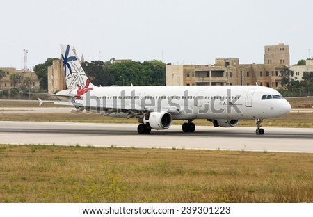 Luqa. Malta July 9, 2006: Air Mediterranee Airbus A321-211 landing runway 14.
