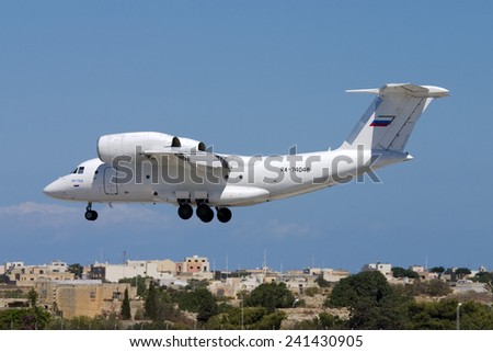 Luqa, Malta June 9, 2007: Sverdlovsk 2nd Air Enterprise Antonov An-74D landing runway 32. The An-74 is a Short take off and landing (STOL) turbofan aircraft.