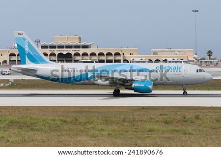 Luqa, Malta July 2, 2007: Clickair Airbus A320-214 just landed runway 14. Clickair was later bought by Vueling Airlines.