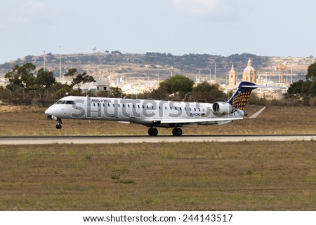 Luqa, Malta September 28, 2014: Eurowings Bombardier CRJ-900 NG (CL-600-2D24) lifts off from runway 13.