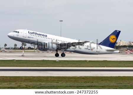 Luqa, Malta March1, 2008: Lufthansa Airbus A320-211 lifts off from runway 32.