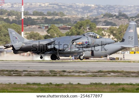 Luqa, Malta September 28, 2009: Royal Air Force British Aerospace Harrier GR7A departing Malta runway 06 after participating in the Malta International Airshow the previous 2 days.