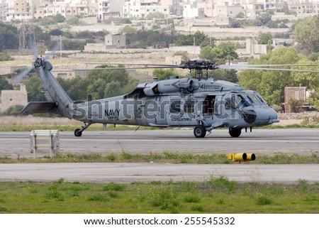Luqa, Malta September 28, 2009: US Navy Sikorsky MH-60S Knighthawk (S-70A) lifts off for a runway 06 departure after participating in the Malta International Airshow the previous 2 days.