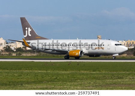 Luqa, Malta January 7, 2012: Jet Time Boeing 737-3L9 backtracking runway 31 for take off.